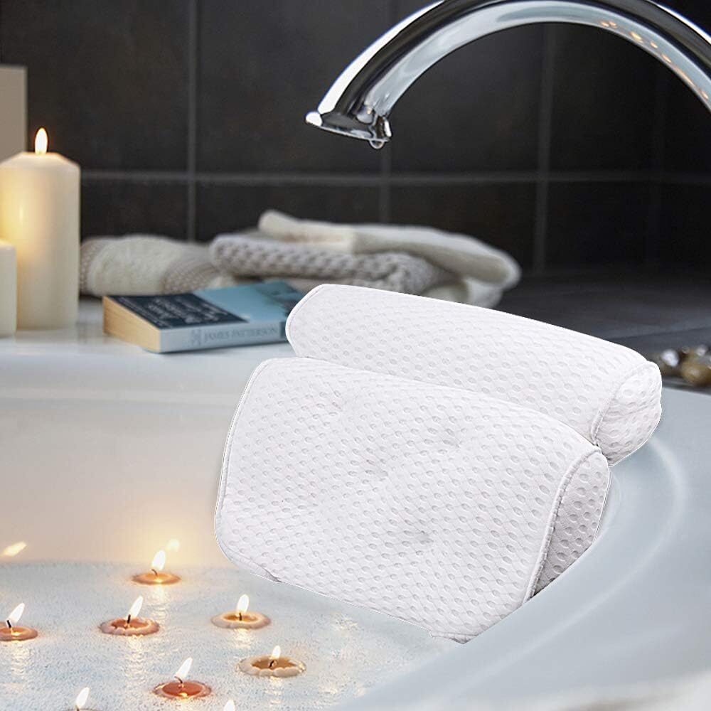 AmazeFan bath pillow with 7 stitched suction cups providing neck and shoulder support in a bathtub